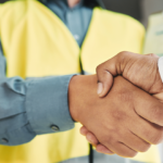 handshake of construction managers symbolizing collaboration in construction