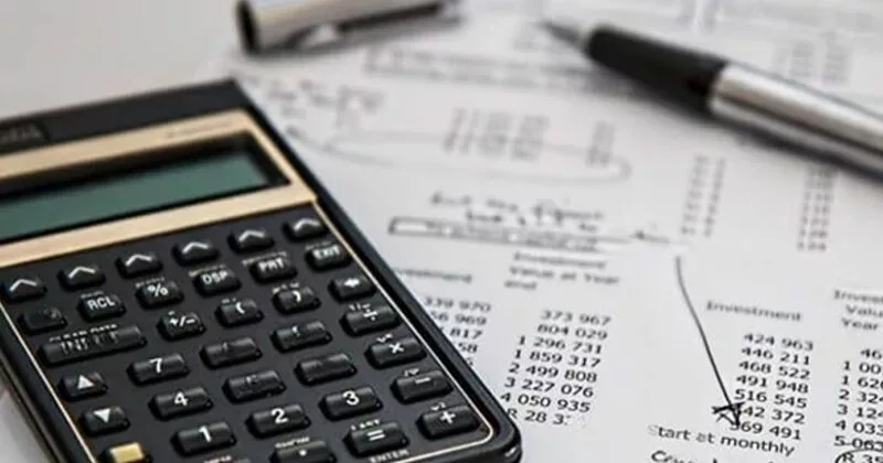 cost estimation in construction symbolized by calculator